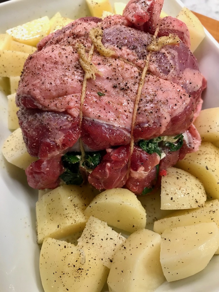 Leg of lamb with potatoes, ready to roast